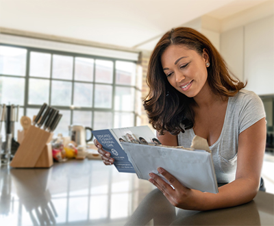 Woman reading direct mail