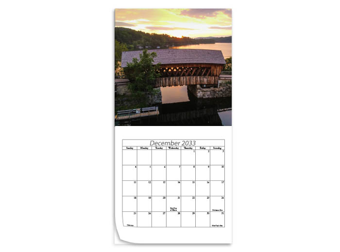 8x8 Calendar Printing - A picture of a sunset behind a covered bridge on top and the month and dates below